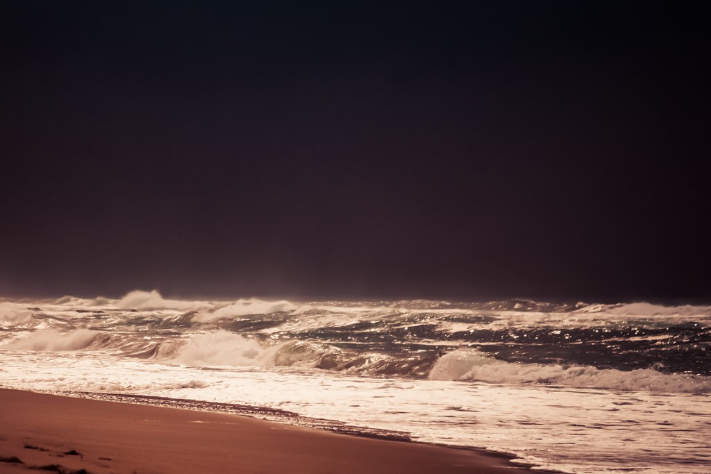 alt="unusual weather provides opportunity for dramatic landscape like this beach"