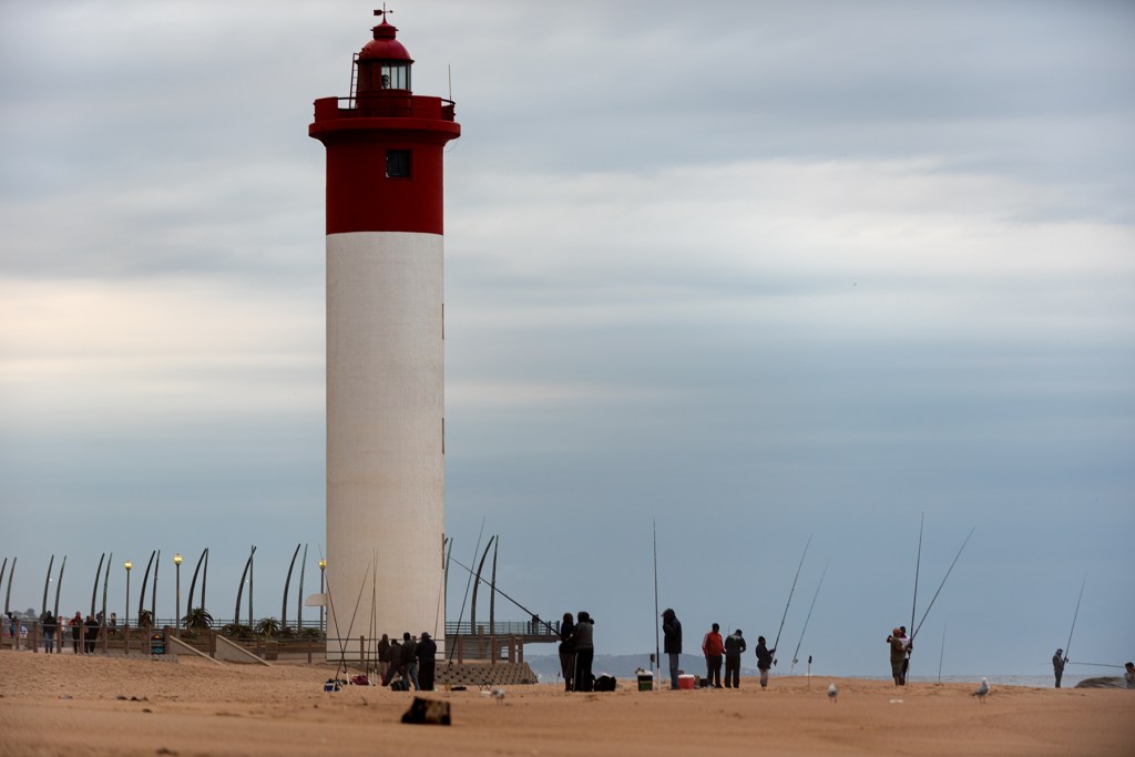 alt="lighthouse is the focal point and subject of the photograph"