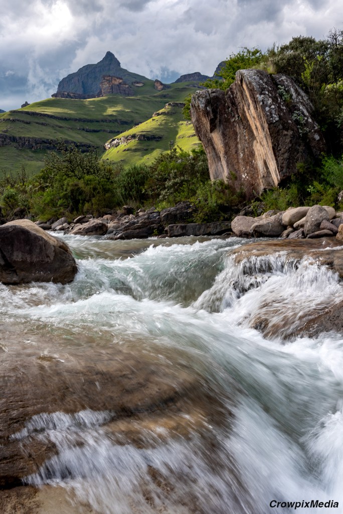 slow shutter speeds create motion blur as shown in the waterfall in the above photograph